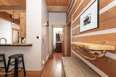 This stunning mountain retreat offers a perfect blend of rustic on Grand Elk Ranch and Club in Colorado - for sale on GolfHomes.com, golf home, golf lot