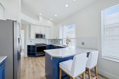 Step inside and discover a beautifully renovated, light-filled on University Park Country Club in Florida - for sale on GolfHomes.com, golf home, golf lot