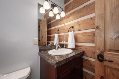 This stunning mountain retreat offers a perfect blend of rustic on Grand Elk Ranch and Club in Colorado - for sale on GolfHomes.com, golf home, golf lot