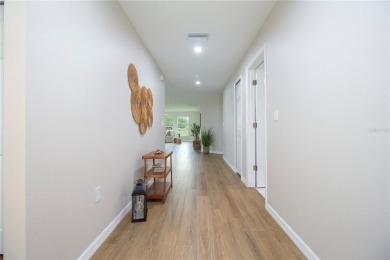 Welcome to this one-of-a-kind, newly built home in the heart of on Oak Hills Country Club in Florida - for sale on GolfHomes.com, golf home, golf lot