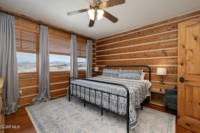 This stunning mountain retreat offers a perfect blend of rustic on Grand Elk Ranch and Club in Colorado - for sale on GolfHomes.com, golf home, golf lot