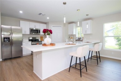 Welcome to this one-of-a-kind, newly built home in the heart of on Oak Hills Country Club in Florida - for sale on GolfHomes.com, golf home, golf lot