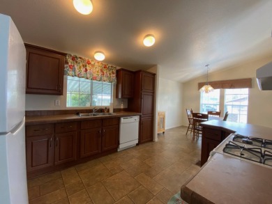 This 2009, 1325sf manufacture home was first sold in 2011. This on Carlton Oaks Country Club in California - for sale on GolfHomes.com, golf home, golf lot