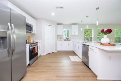 Welcome to this one-of-a-kind, newly built home in the heart of on Oak Hills Country Club in Florida - for sale on GolfHomes.com, golf home, golf lot