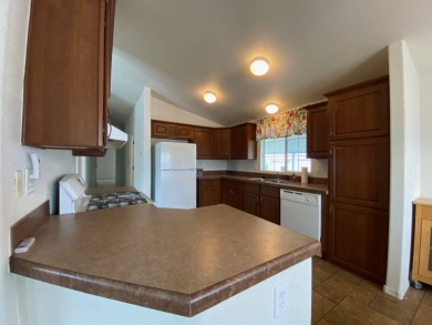 This 2009, 1325sf manufacture home was first sold in 2011. This on Carlton Oaks Country Club in California - for sale on GolfHomes.com, golf home, golf lot