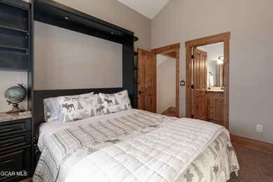 This stunning mountain retreat offers a perfect blend of rustic on Grand Elk Ranch and Club in Colorado - for sale on GolfHomes.com, golf home, golf lot