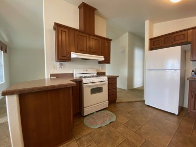 This 2009, 1325sf manufacture home was first sold in 2011. This on Carlton Oaks Country Club in California - for sale on GolfHomes.com, golf home, golf lot