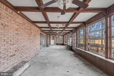 Welcome to this expansive 4-bedroom, 2.5-bath rambler nestled in on National Golf Club At Tantallon in Maryland - for sale on GolfHomes.com, golf home, golf lot