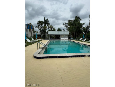 ATTENTION INVESTORS! This lovely 2nd floor, end-unit condo is on El Rio Golf Course and Club in Florida - for sale on GolfHomes.com, golf home, golf lot