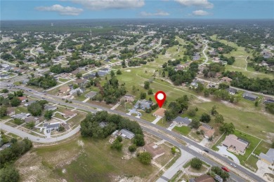 Welcome to this one-of-a-kind, newly built home in the heart of on Oak Hills Country Club in Florida - for sale on GolfHomes.com, golf home, golf lot