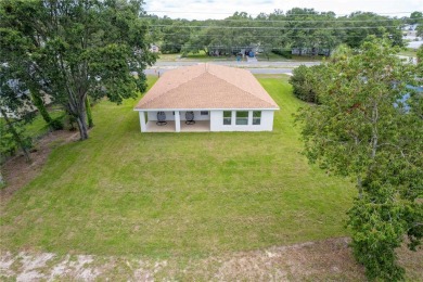 Welcome to this one-of-a-kind, newly built home in the heart of on Oak Hills Country Club in Florida - for sale on GolfHomes.com, golf home, golf lot