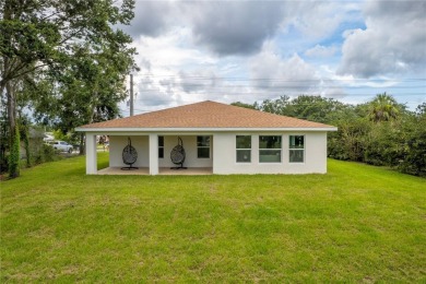 Welcome to this one-of-a-kind, newly built home in the heart of on Oak Hills Country Club in Florida - for sale on GolfHomes.com, golf home, golf lot