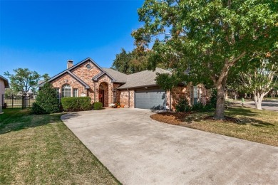 Welcome to your dream home! Nestled along the scenic fairways on Stewart Peninsula Golf Course in Texas - for sale on GolfHomes.com, golf home, golf lot