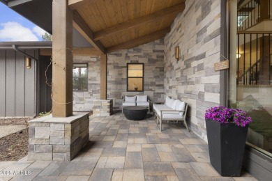 Nestled on 2.35 wooded acres in a tranquil cul-de-sac in Forest on Forest Highlands Golf Club - The Meadow in Arizona - for sale on GolfHomes.com, golf home, golf lot