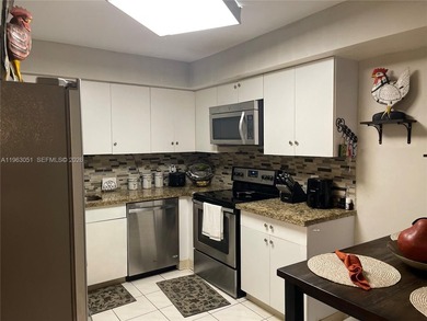 This stunning condo boasts two generously sized master bedrooms on Bonaventure Country Club in Florida - for sale on GolfHomes.com, golf home, golf lot