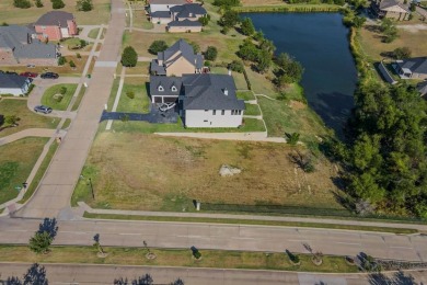 5-acre corner lot with a picturesque view in the scenic Lake on Tangle Ridge Golf Club in Texas - for sale on GolfHomes.com, golf home, golf lot