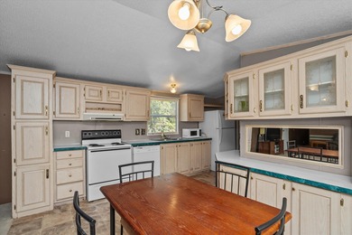 Discover the perfect getaway with this 3 bedroom, 2 bathroom on Rayburn Country Club in Texas - for sale on GolfHomes.com, golf home, golf lot