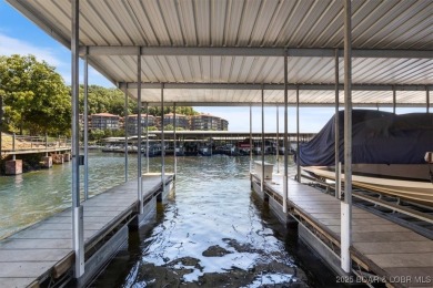 A phenomenal main channel view from the minute you walk in this on Tan-Tar-A Golf Club in Missouri - for sale on GolfHomes.com, golf home, golf lot
