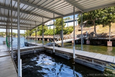 A phenomenal main channel view from the minute you walk in this on Tan-Tar-A Golf Club in Missouri - for sale on GolfHomes.com, golf home, golf lot