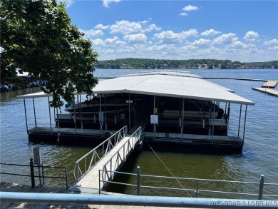 A phenomenal main channel view from the minute you walk in this on Tan-Tar-A Golf Club in Missouri - for sale on GolfHomes.com, golf home, golf lot