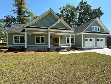 Experience luxury living in this stunning brand new 5-bed, 3 on Santee-Cooper Country Club in South Carolina - for sale on GolfHomes.com, golf home, golf lot