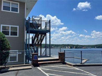 A phenomenal main channel view from the minute you walk in this on Tan-Tar-A Golf Club in Missouri - for sale on GolfHomes.com, golf home, golf lot