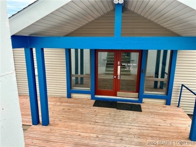 A phenomenal main channel view from the minute you walk in this on Tan-Tar-A Golf Club in Missouri - for sale on GolfHomes.com, golf home, golf lot