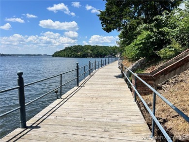 A phenomenal main channel view from the minute you walk in this on Tan-Tar-A Golf Club in Missouri - for sale on GolfHomes.com, golf home, golf lot