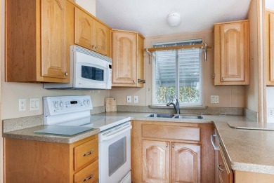 Welcome to your own private retreat in this stunning 1 bedroom on Palm Creek Golf and RV Resort in Arizona - for sale on GolfHomes.com, golf home, golf lot