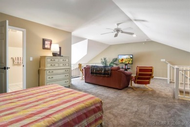 Welcome to this top floor waterfront condo with breathtaking on The Club At Old Kinderhook in Missouri - for sale on GolfHomes.com, golf home, golf lot