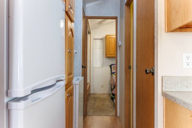 Welcome to your own private retreat in this stunning 1 bedroom on Palm Creek Golf and RV Resort in Arizona - for sale on GolfHomes.com, golf home, golf lot