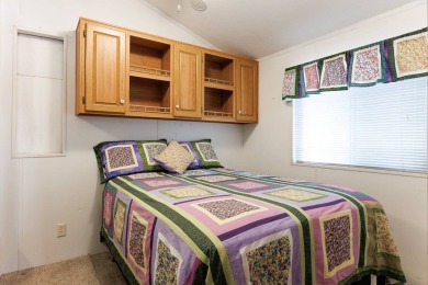 Welcome to your own private retreat in this stunning 1 bedroom on Palm Creek Golf and RV Resort in Arizona - for sale on GolfHomes.com, golf home, golf lot