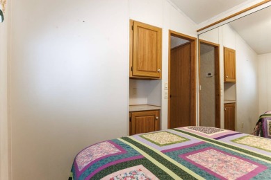 Welcome to your own private retreat in this stunning 1 bedroom on Palm Creek Golf and RV Resort in Arizona - for sale on GolfHomes.com, golf home, golf lot