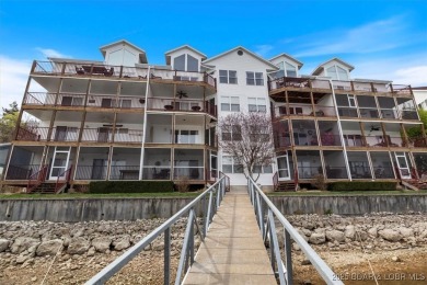 Welcome to this top floor waterfront condo with breathtaking on The Club At Old Kinderhook in Missouri - for sale on GolfHomes.com, golf home, golf lot