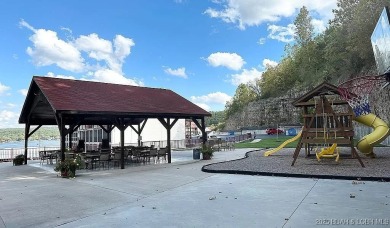 Welcome to this top floor waterfront condo with breathtaking on The Club At Old Kinderhook in Missouri - for sale on GolfHomes.com, golf home, golf lot