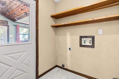 Welcome home to a warm and inviting retreat tucked away among on Holly Lake Ranch Golf Club in Texas - for sale on GolfHomes.com, golf home, golf lot