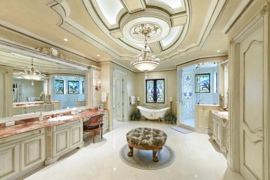 This prestigious estate in St Andrews Country Club, with 5 on St. Andrews Country Club of Boca Raton in Florida - for sale on GolfHomes.com, golf home, golf lot