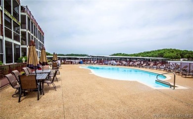 Welcome to this top floor waterfront condo with breathtaking on The Club At Old Kinderhook in Missouri - for sale on GolfHomes.com, golf home, golf lot