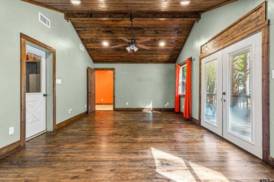 Welcome home to a warm and inviting retreat tucked away among on Holly Lake Ranch Golf Club in Texas - for sale on GolfHomes.com, golf home, golf lot