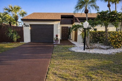 Welcome home! Fully renovated luxury patio home stands far above on Poinciana Golf Club in Florida - for sale on GolfHomes.com, golf home, golf lot