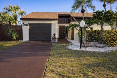 Welcome home! Fully renovated luxury patio home stands far above on Poinciana Golf Club in Florida - for sale on GolfHomes.com, golf home, golf lot