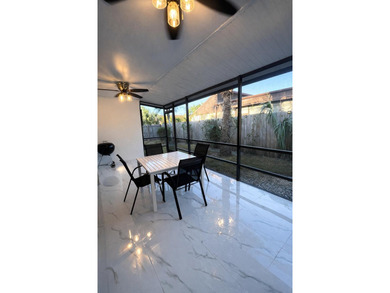 Welcome home! Fully renovated luxury patio home stands far above on Poinciana Golf Club in Florida - for sale on GolfHomes.com, golf home, golf lot