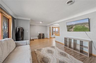 This updated 4-bedroom, 2-bath home is in a great Saint Paul on Phalen Park Golf Course in Minnesota - for sale on GolfHomes.com, golf home, golf lot