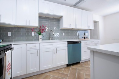 This is a must-see home, a completely updated condo, so do not on Kings Point Executive Golf Course in Florida - for sale on GolfHomes.com, golf home, golf lot