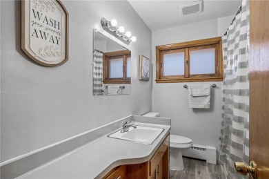 This updated 4-bedroom, 2-bath home is in a great Saint Paul on Phalen Park Golf Course in Minnesota - for sale on GolfHomes.com, golf home, golf lot