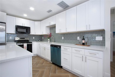 This is a must-see home, a completely updated condo, so do not on Kings Point Executive Golf Course in Florida - for sale on GolfHomes.com, golf home, golf lot