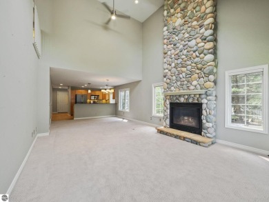 Bass Lake front Quality Condo with sunset views. Tile, Granite on Elk Rapids Golf Club in Michigan - for sale on GolfHomes.com, golf home, golf lot
