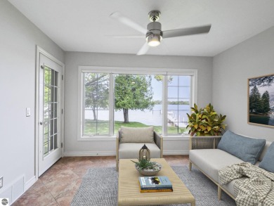 Bass Lake front Quality Condo with sunset views. Tile, Granite on Elk Rapids Golf Club in Michigan - for sale on GolfHomes.com, golf home, golf lot