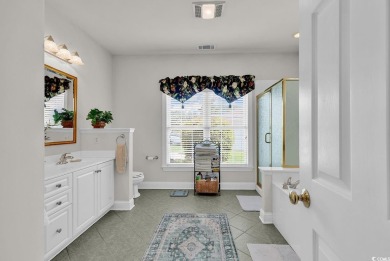 Welcome to 4507 Smilax Place, a stunning custom-built 4-bedroom on Wachesaw Plantation East Golf Course in South Carolina - for sale on GolfHomes.com, golf home, golf lot