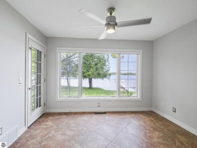 Bass Lake front Quality Condo with sunset views. Tile, Granite on Elk Rapids Golf Club in Michigan - for sale on GolfHomes.com, golf home, golf lot